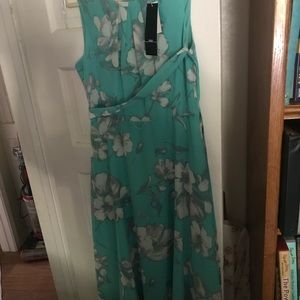 2 long maxi dresses size says 10 but really fits like a 7 (new w/tags )